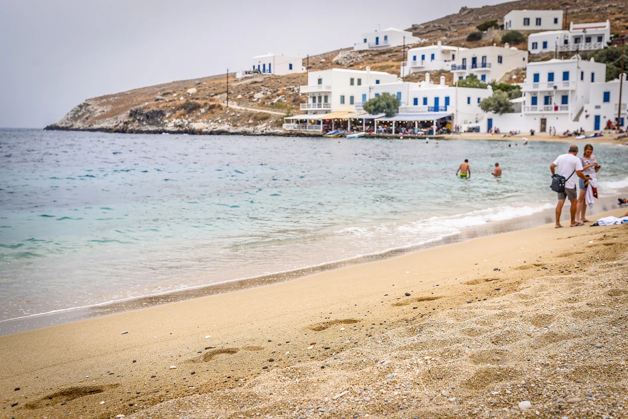 Dramatic white cliffs above a Greek island beach